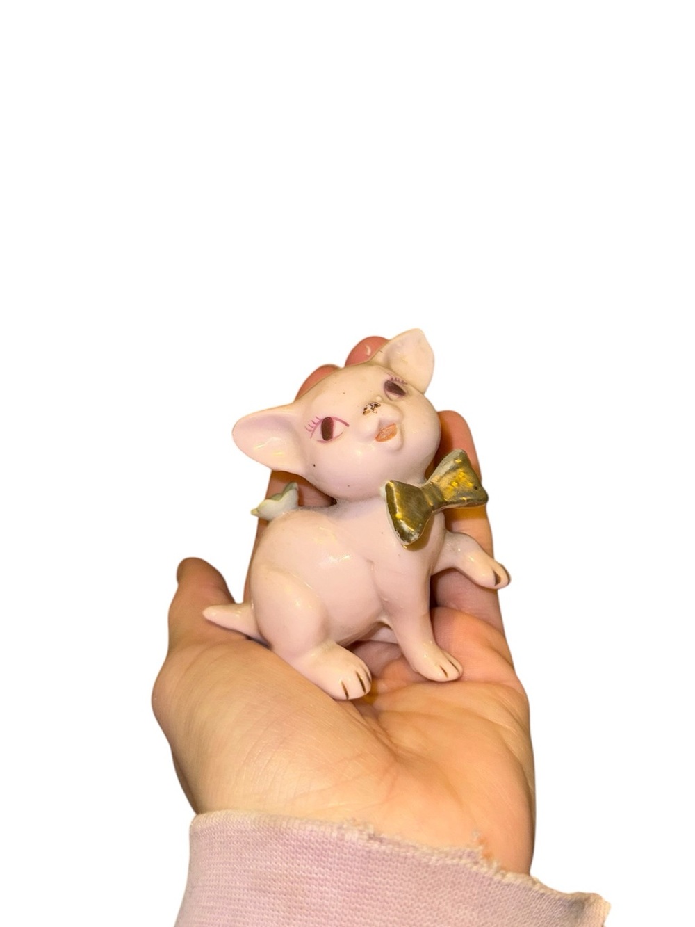 Vintage pink kitty figurine with gold bow